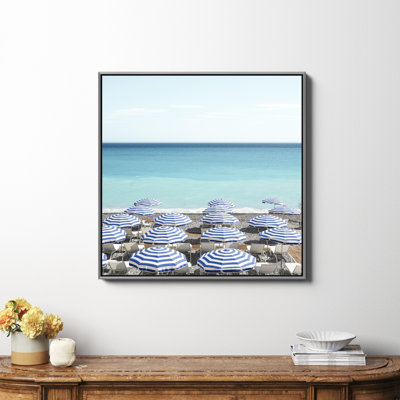 Blue Beach Umbrellas Photo by Henrike Schenk