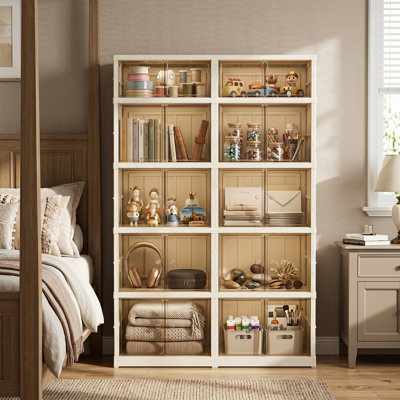 Armoire de rangement pliante tout-en-un Adelaine, 5 compartiments en plastique 424QT avec portes et roues magnétiques Adelaine