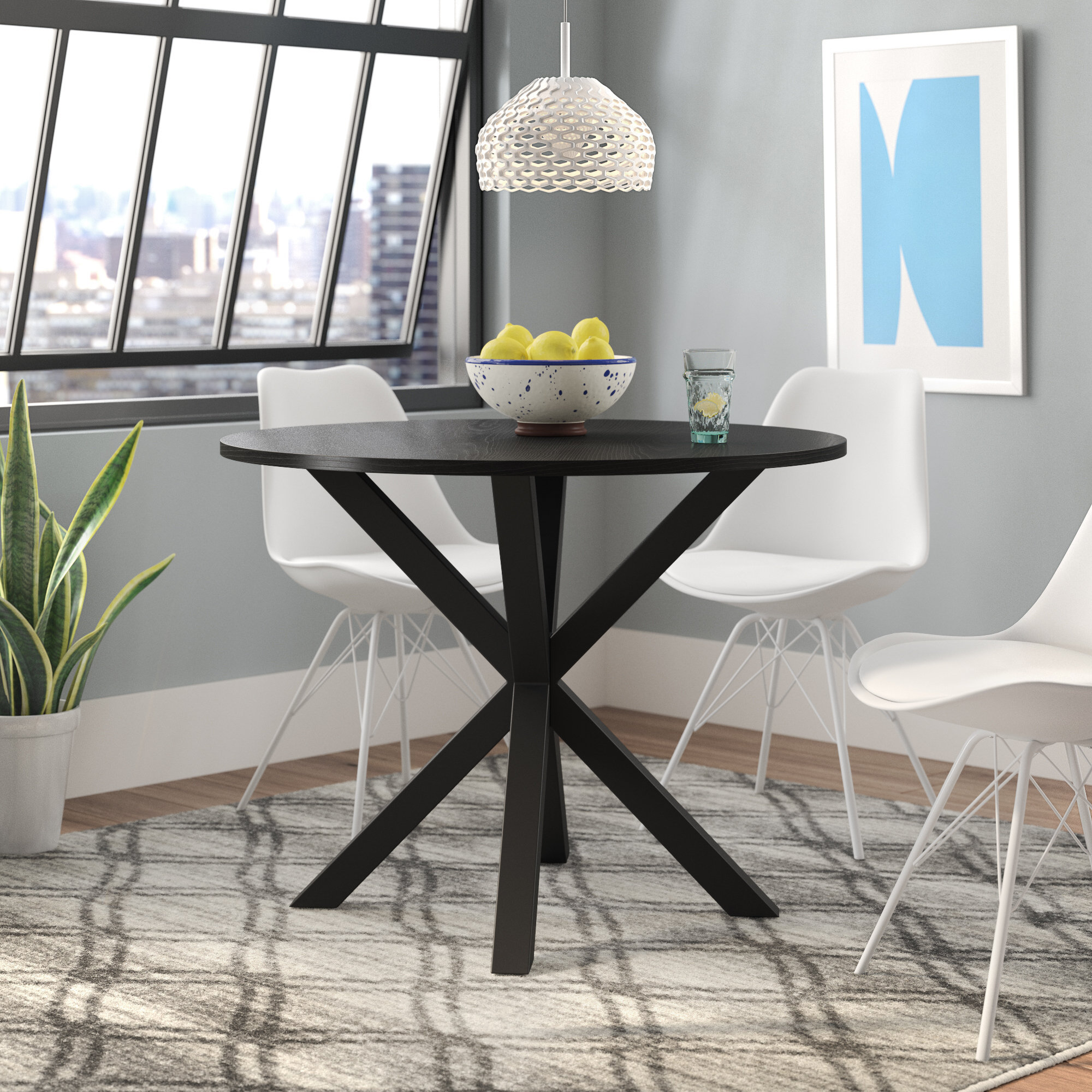 Round dining table with black chairs hot sale