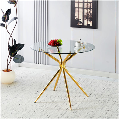 Table de salle à manger moderne en verre trempé avec pieds en métal chromé, peu encombrante et élégante pour tout salon