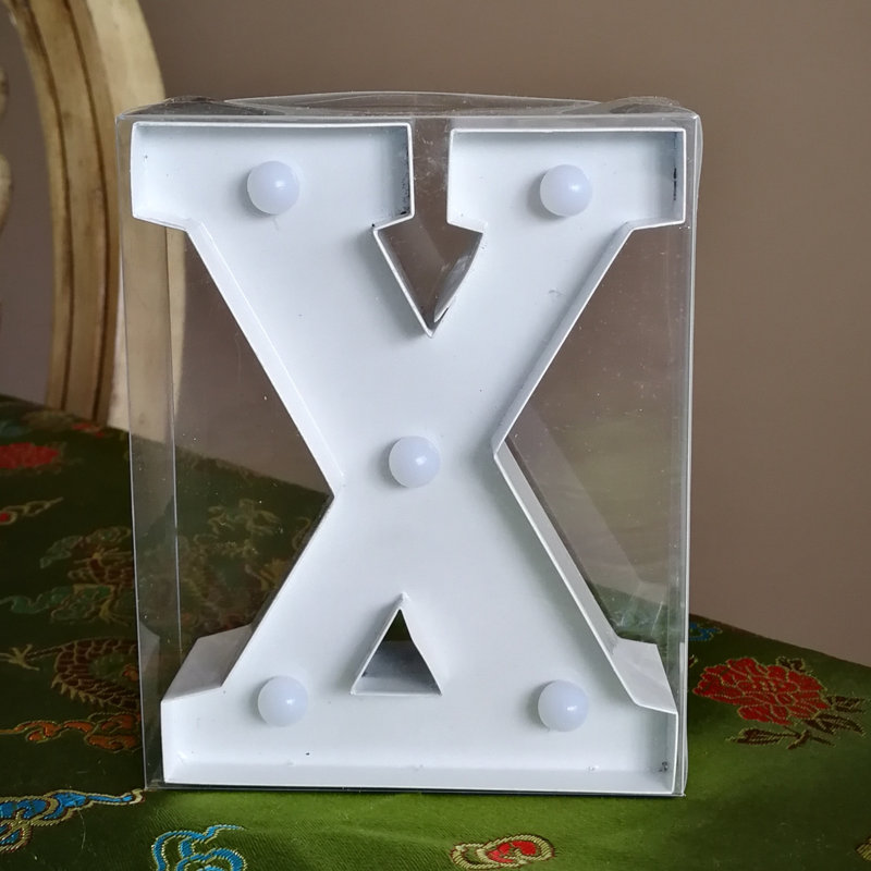 Enseigne lumineuse del x lettre, Blanc