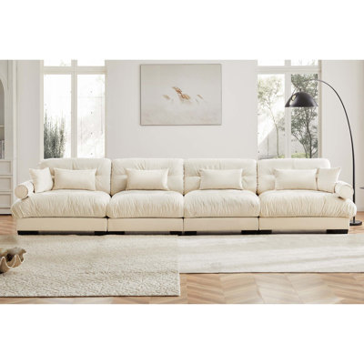 Canapé modulaire surdimensionné en velours super confortable avec repose-pieds mobile