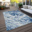 Tapis ivoire / bleu marine en polyester tissé à la machine Chayden-98157858