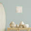 Art mural large sur fond beige à larges branches de corail, design par Yvette St. Amant