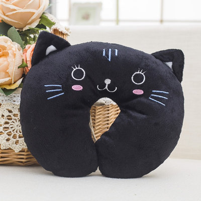 Joli coussin en forme de U