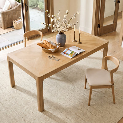 Table de salle à manger rectangulaire avec plateau de style parquet, coins arrondis, pieds courbés et pieds réglables