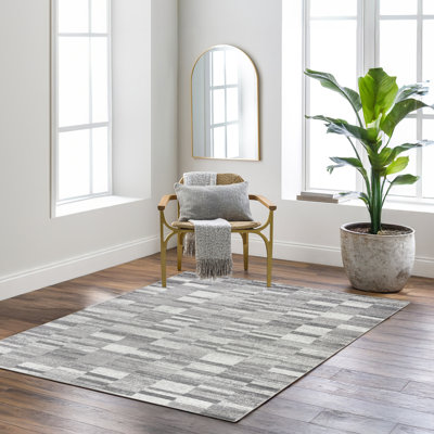 Alhagie Striped Area Rug