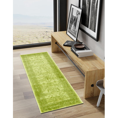 Tapis vert clair à motif botanique Godina