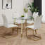 Table ronde en verre de style moderne, design transparent élégant, base de support durable, ensemble de chaises de salle à manger en polyuréthane blanc, pieds de chaise plaqués or, convient aux cuisines de restaurant (ensemble de 5)