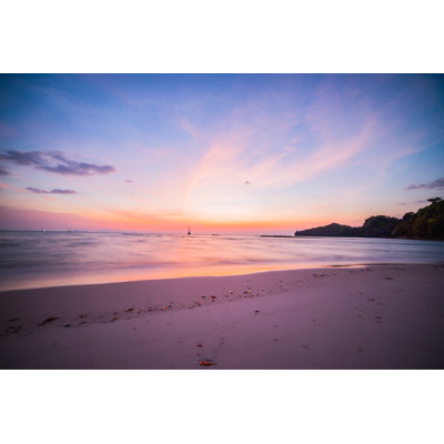 Beach And Sunset by Khlongwangchao - Wrapped Canvas Print