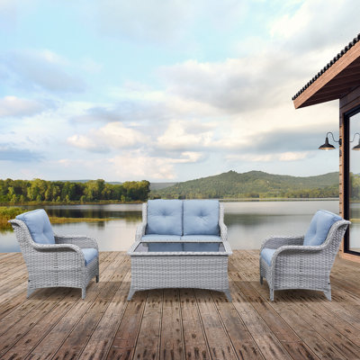 Schutt Rattan Wicker 4 - Person Seating Group with Cushions by Red Barrel Studio