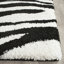 Braylee Animal Print Area Rug-91934457