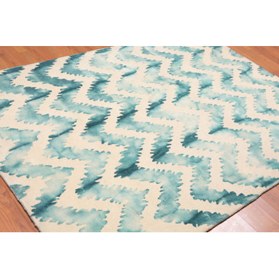 Tapis beige en laine touffeté fait main