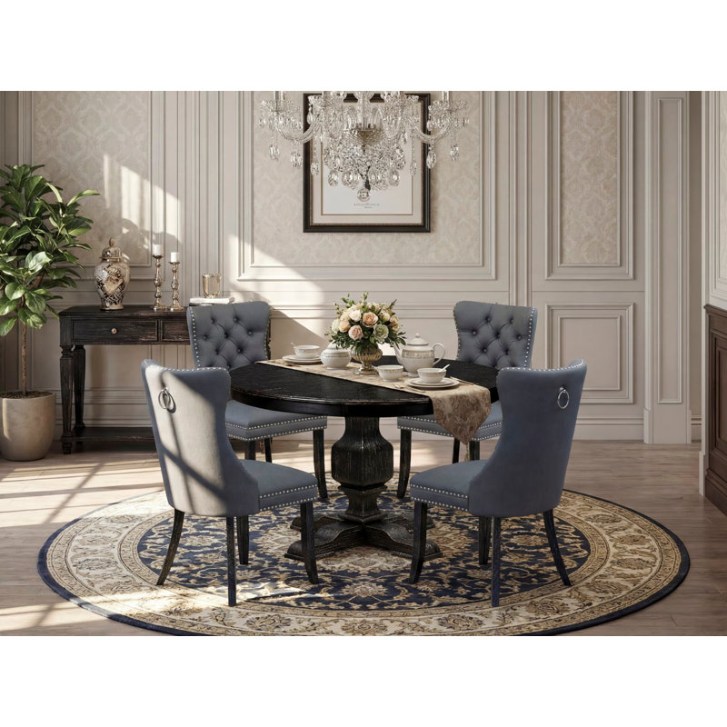 Ensemble de salle à manger 5 pièces en polyester avec 4 chaises de cuisine gris platine, des dossiers capitonnés et une table ronde de 48 po au fini noir sablé.