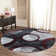 Tapis noir à motif abstrait Adonia