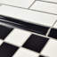 Neros 7.9" x 1.3" Glossy Ceramic Mudcap Tile Trim in Nero