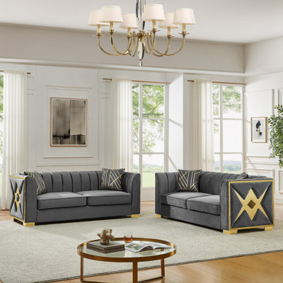 Velvet Button-Tufted Three-Seater Sofa With Gold Stainless Steel Accents, Luxurious Comfort And Timeless Chesterfield Design For Living Spaces.