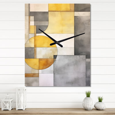 Horloge murale jaune et grise entrecroisée I - formes abstraites