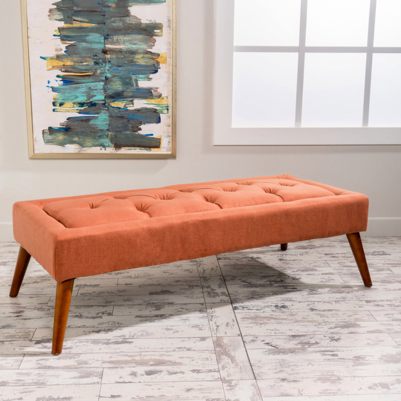 Dessus capitonné - Tissu orange attrayant avec pieds inclinés. Matériau en bouleau. 52 po X 23 16 28 lb Des sièges polyvalents et merveilleux. Ajoute du caractère à la pièce. Profondeur Largeur Hauteur. Lb