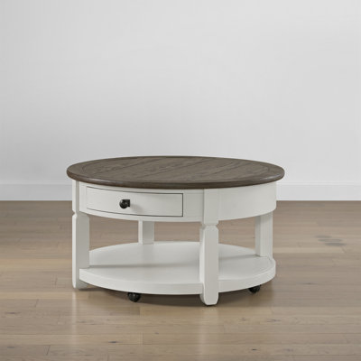 Round Cocktail Table With Drawer And Casters