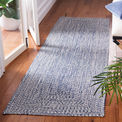 Trombetta Hand Woven Area Rug in Dark Blue/Ivory