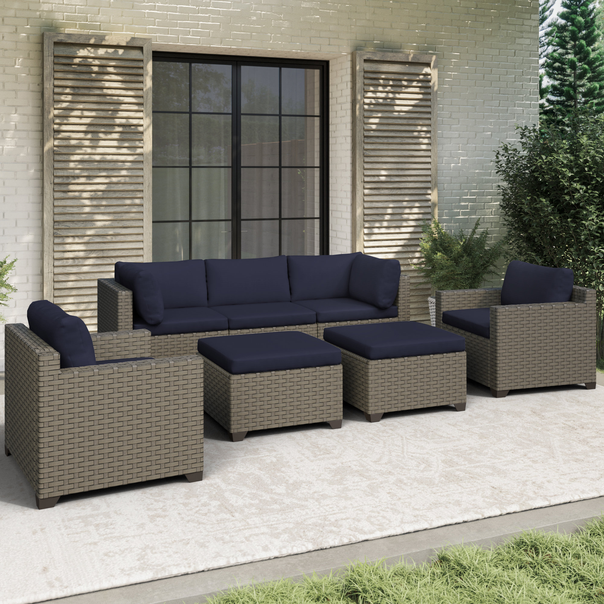 https://assets.wfcdn.com/im/58324274/compr-r85/2384/238417016/avalisse-5-piece-outdoor-conversation-set-with-two-ottomans-in-summer-fog-wicker.jpg