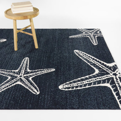 Tapis étoile de mer bleu marine Cove