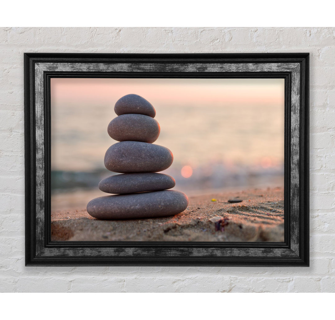 Gerahmter Fotodruck Zen Stones Stacked Up On Beach