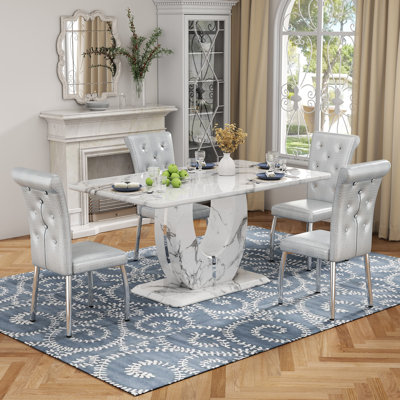Modern 63" Faux Marble Dining Table Set with Spring-Supported PU Leather Chairs