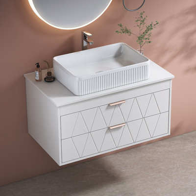 Meuble-lavabo moderne simple avec lavabo vasque en céramique et armoire de rangement large, idéal pour organiser les essentiels de salle de bain et rehausser le style