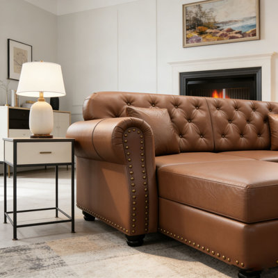 Upholstered Faux Leather Sofa with Nailhead Trim and Rolled Armrests