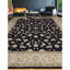 Tapis noir et doré de haute qualité noué à la main