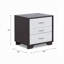 Table de chevet avec 3 tiroirs Space - blanc et noir pour créer une atmosphère de chambre à coucher apaisante