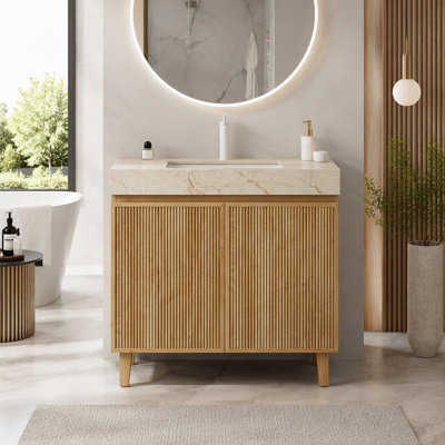 Meuble-lavabo avec lavabo en céramique et comptoir en pierre frittée veinée, sur pied