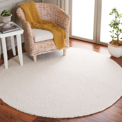 Borinka Solid Color Hand Tufted Wool Area Rug in Ivory