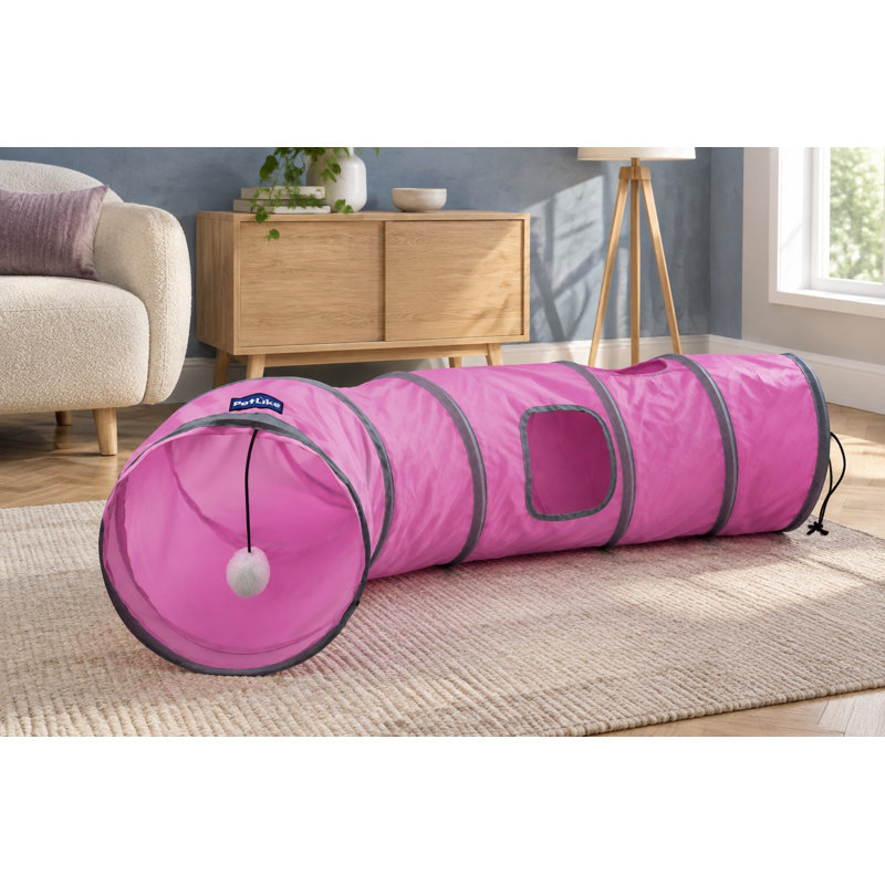 Ce tunnel pliable et escamotable rose S-Way pour animaux de compagnie est fourni avec une balle et conçu comme un tube de jeu secret pour les chats.