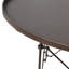 Table basse ronde en métal avec pieds à griffes