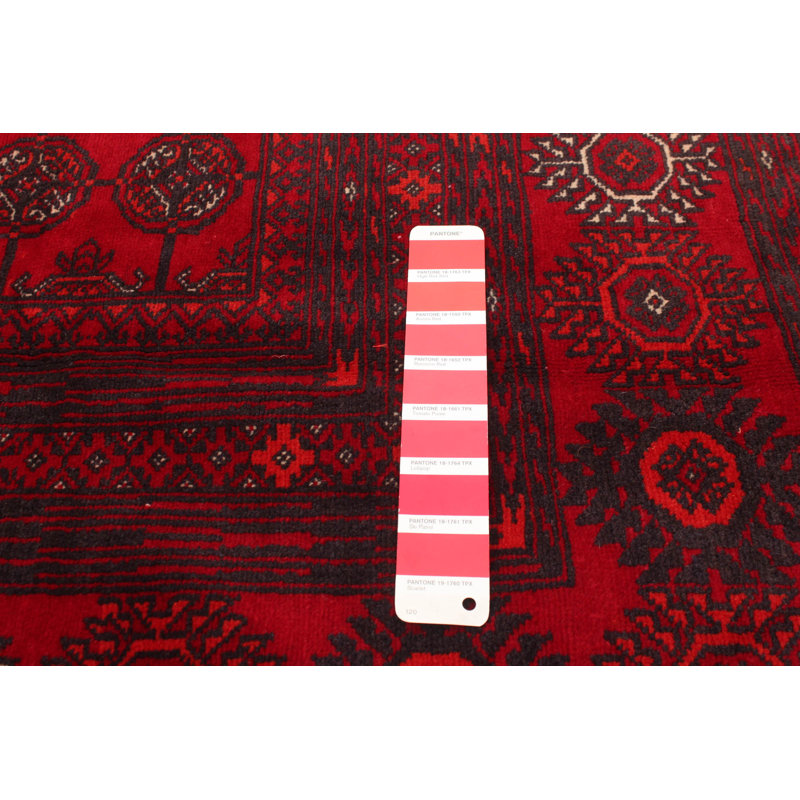 Tapis unique en laine noué à la main rouge Balouch des années 1980 de 6 pi 6 po x 10 pi 2 po Caspin