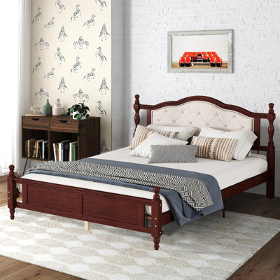Queen size solid wood bed with upholstered headboard and footboard
