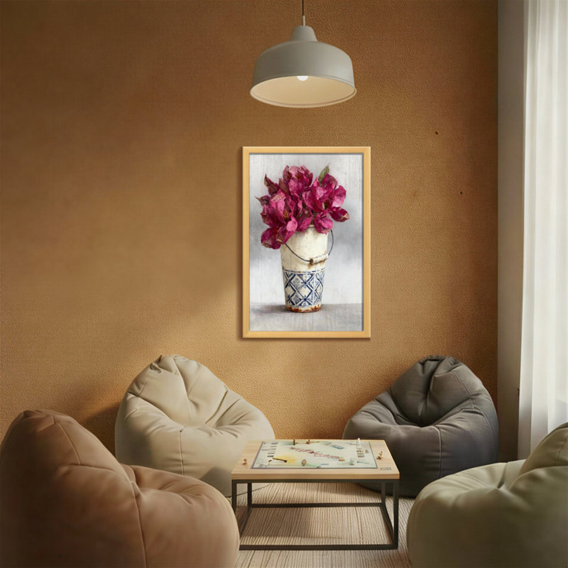 Arrangement floral de plantes et de fleurs dans un motif de seau rétro