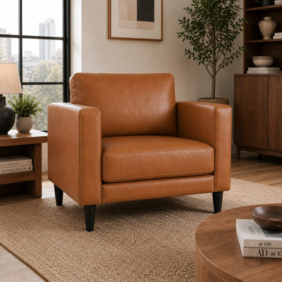 Fauteuil d'appoint Esin en cuir véritable, style moderne du milieu du siècle, canapé compact idéal pour le salon, les appartements urbains, le bureau à domicile et les chambres d'amis.
