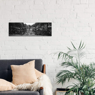 Bicycle Leaning Against A Metal Railing On A Bridge, Amsterdam, Netherlands - Wrapped Canvas Panoramic Print