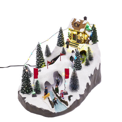 Kurt Adler Motion, village de ski de Noël à DEL