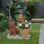 Statue d'extérieur de jardinière solaire chiot assis
