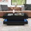 Table basse moderne avec finition ultrabrillante, lumière DEL, rangement et design géométrique-1084280304