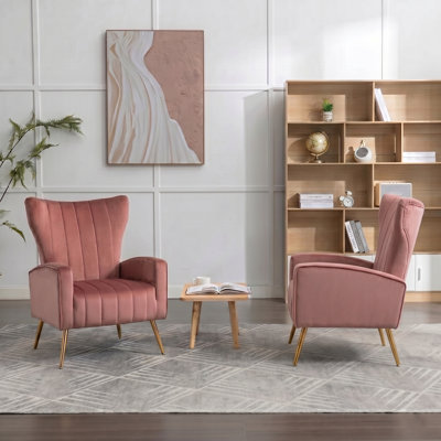 Fauteuil en velours à pieds en métal