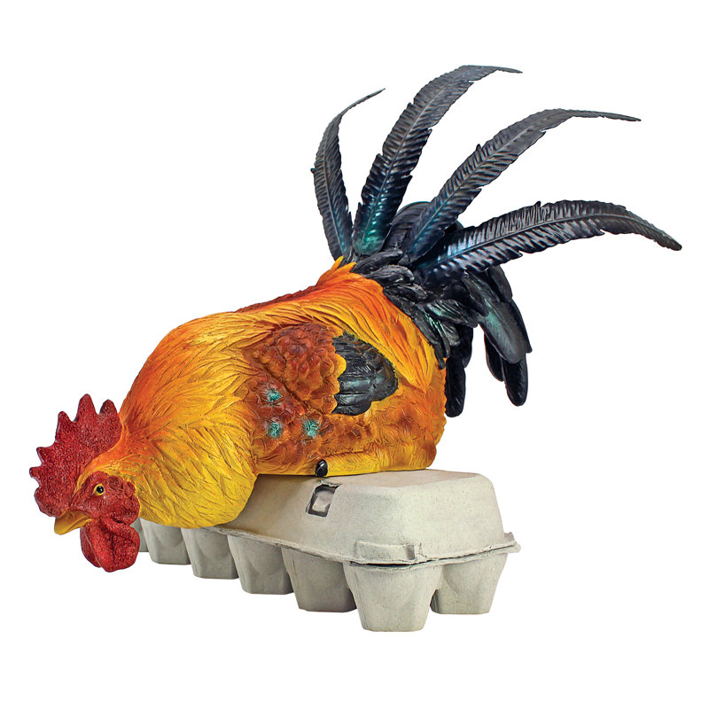 Statue de coq perché assis