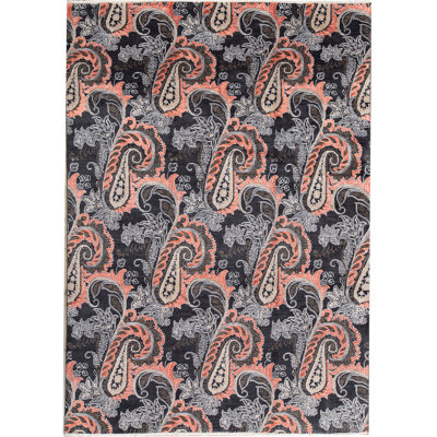 Geometric Area Rug in Black/Rust