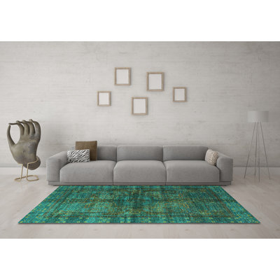 Tapis oriental en chenille tissé à la machine en bleu