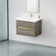 Meuble-lavabo de 30 po avec lavabo. Espace de rangement flottant gris cendré. Pré-assemblé pour plus de commodité. Organisation intérieure en forme de U. Comptoir en résine de pierre. Mécanisme de tiroir à fermeture silencieuse.